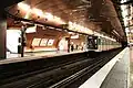 Parisian underground station of Arts & Métiers, founded in 1904, which is served by Line 3 and Line 11. For its renovation in 1988, the Ouï-dire style was applied to Line 3, whilst on Line 11, for the bicentenary anniversary of CNAM in 1994, the platforms were redesigned by Belgian comics cartoonist François Schuiten in a steampunk style reminiscent of the science fiction works of Jules Verne.[29]