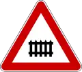 Level crossing with a railway with barriers