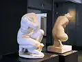 Two copies of Doidalsas' Crouching Venus: left in Parian marble (from Palermo Street, Rome) and right from the baths of Hadrian's Villa.[45][46]
