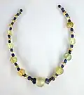 Glass bead necklace, Amlash, Iran, 10th - 8th century - JC (?), Ramat-Abad excavations. Royal Museums of Art and History, Decorative Arts section, Parc du Cinquantenaire, Brussels.