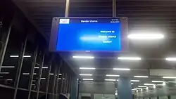 An electronic board at the entrance of the station