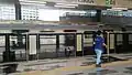 An MRT train stopping at Mutiara Damansara MRT station