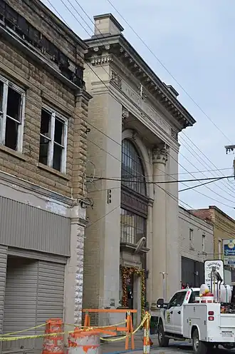 A gray neoclassical building.