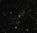 Magnifying the distant universe through MACS J0454.1-0300.[34]