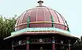 Maharajah's well cupola with wording "His Highness the Maharajah of Benares"