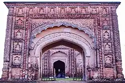 Front view with the mosque gate