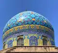 The main dome of the mosque which rests on a bricked portico