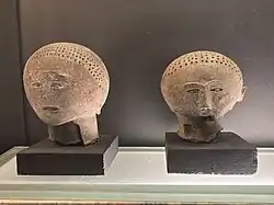 Jar lids in the shape of a human face
