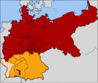 The North German Confederation (red). The southern German states that joined in 1871 to form the German Empire are in orange. Alsace–Lorraine, the territory annexed following the Franco-Prussian War of 1870–1871, is in tan. The red territory in the south marks the original principality of the House of Hohenzollern, rulers of the Kingdom of Prussia.
