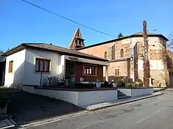 The town hall and church in Marignac-Lasclares