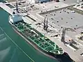 Marine loading arm connected to ship Air view