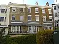 Cream coloured mathematical tiles on houses in Marine Square Location on Google Maps