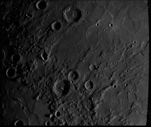 Mariner 10 image. Ailey is a small crater left of center, mostly in shadow