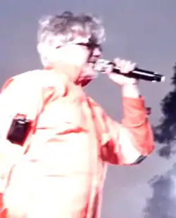 Mothersbaugh performing live with [[Devo]] in 2018