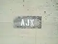 AJX Bridge marker on southern pier