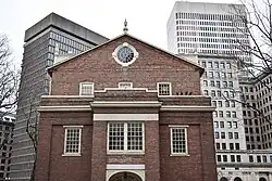 View of the building's eastern facade, Downtown Providence is visible in the background