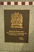 Plaque marking a time capsule to be opened in 2035.