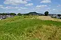 Front (viewed from the rear circular mound, with Mt. Unebi in the background)