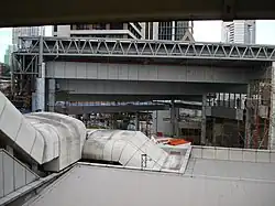 Plaza connecting the two stations under construction