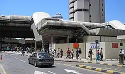 Partial exterior view of the Ampang Line and Sri Petaling's Masjid Jamek station as seen towards the southwest