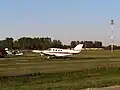 Taxiway and airplanes from Jewett Airport Road