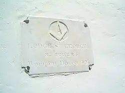 Plaque of the Masonic Lodge which has been housed in the State House since 1815