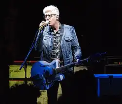 Maher performing in 2015