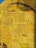 A closeup of the History of Mayfield mosaic located on the corner of Hanbury Street and Maitland Road