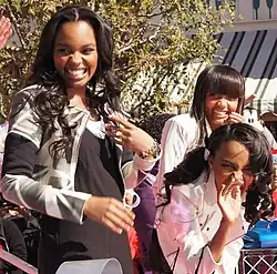 Thriii performing at the 2011 Disney Parks Christmas Day Parade, from left to right: Sierra McClain, China Anne McClain, and Lauryn McClain