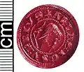An impression of a cast copper-alloy seal matrix of medieval date (14th century AD)