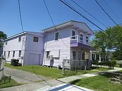 Mehle Street, Arabi, Louisiana - historic building originally part of a lighthouse, formerly housing the St. Bernard Voice, as of 2026 housing Old Arabi Lighthouse Records and Books.