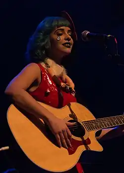 Martinez performing in 2014