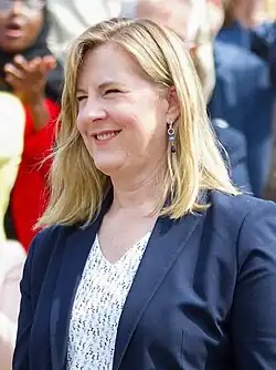 Headshot of Hortman over a muted background