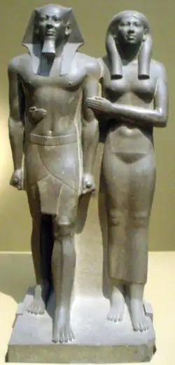 Image 1Greywacke statue of the pharaoh Menkaure and his queen consort, Khamerernebty II. Originally from his Giza temple, now on display at the Museum of Fine Arts, Boston. (from History of ancient Egypt)