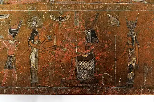 Offering to a falcon-headed god (Horus)