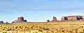 Gray Whiskers to right, next to the broader Mitchell Mesa at far right. View is from WSW along Highway 163.