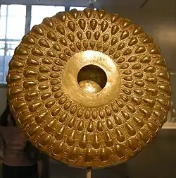 Gold phiale with repoussé bees, acorns, and beechnuts and Greek and Punic inscription (4th–3rd century BC, Met)[17]