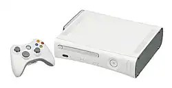 The original Xbox 360 model with an Xbox 360 controller