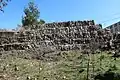Modern stone structure at Har Yavnit, made from reused stones found at Kh. Banit