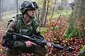 Image 16A soldier from Moldova pulls security while conducting a company situational training exercise during exercise Combined Resolve III at the Joint Multinational Readiness Center in Hohenfels, Germany, Oct. 26, 2014