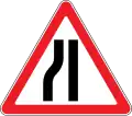 Road narrows on the left