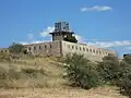 Watchtower over wineyards, known as the "Tour des Anglais" ("Tower of the Englishes"),[93] current establishment of the Army