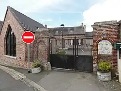 The town hall and school of Montigny-sur-Crécy