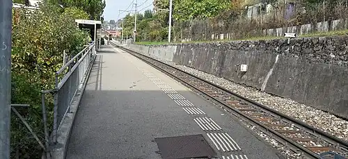 Platform shelter on a platform next to railway line