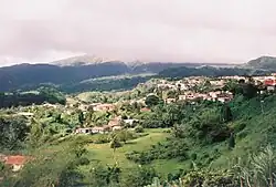 View over Morne-Rouge in the direction of the cloud-hidden Mount Pelée