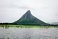 A mountain view taken from the Bui reservoir
