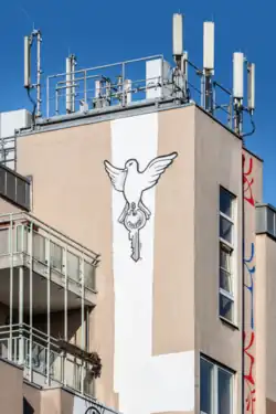 Mr. Paradox Paradise columbidae and mural 'Your ignorance is their power'