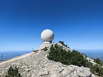 Spherical radar dome on Mont Ventoux, France, protecting a fixed mountain-top radar installation.