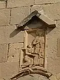 A 7th-century bas-relief from the Monastery of the Holy Cross at Mtskheta, Georgia. It depicts the 7th-century Georgian prince Adarnase praying before Jesus Christ.