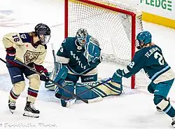 Scamurra (#16) playing for Montreal, December 2025